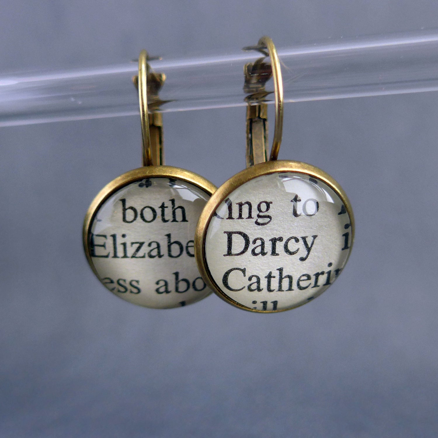 Pair of earrings with pride and prejuduce book pages