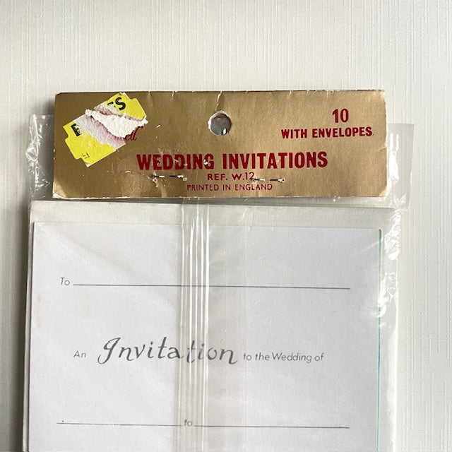 Delgardo Mansell vintage Wedding invitations with envelopes in clear packaging on a white background