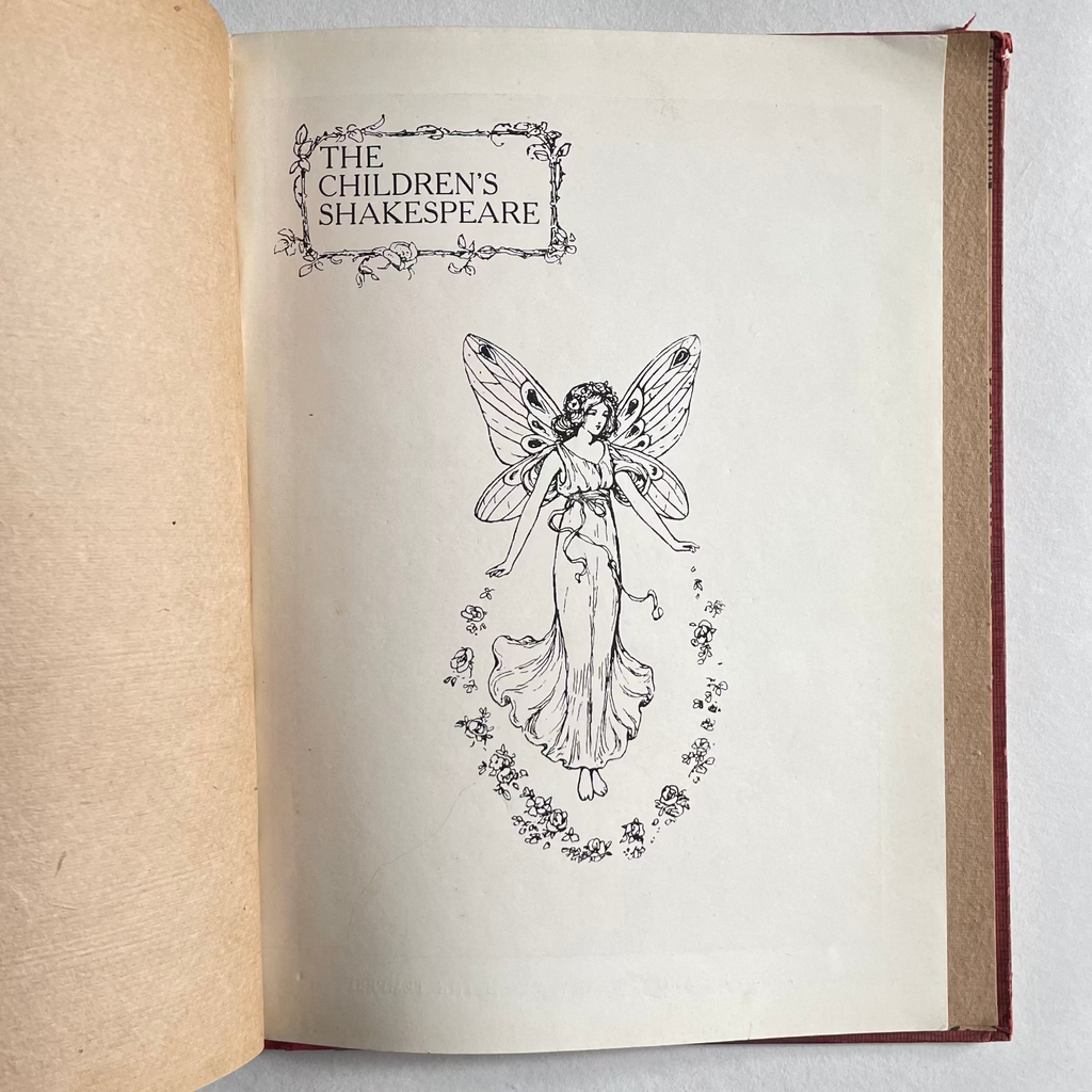 Open book with illustration of a fairy from 'The Children's Shakespeare' on a white background