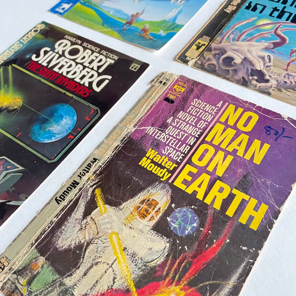 Collection of vintage science fiction book covers on a white background