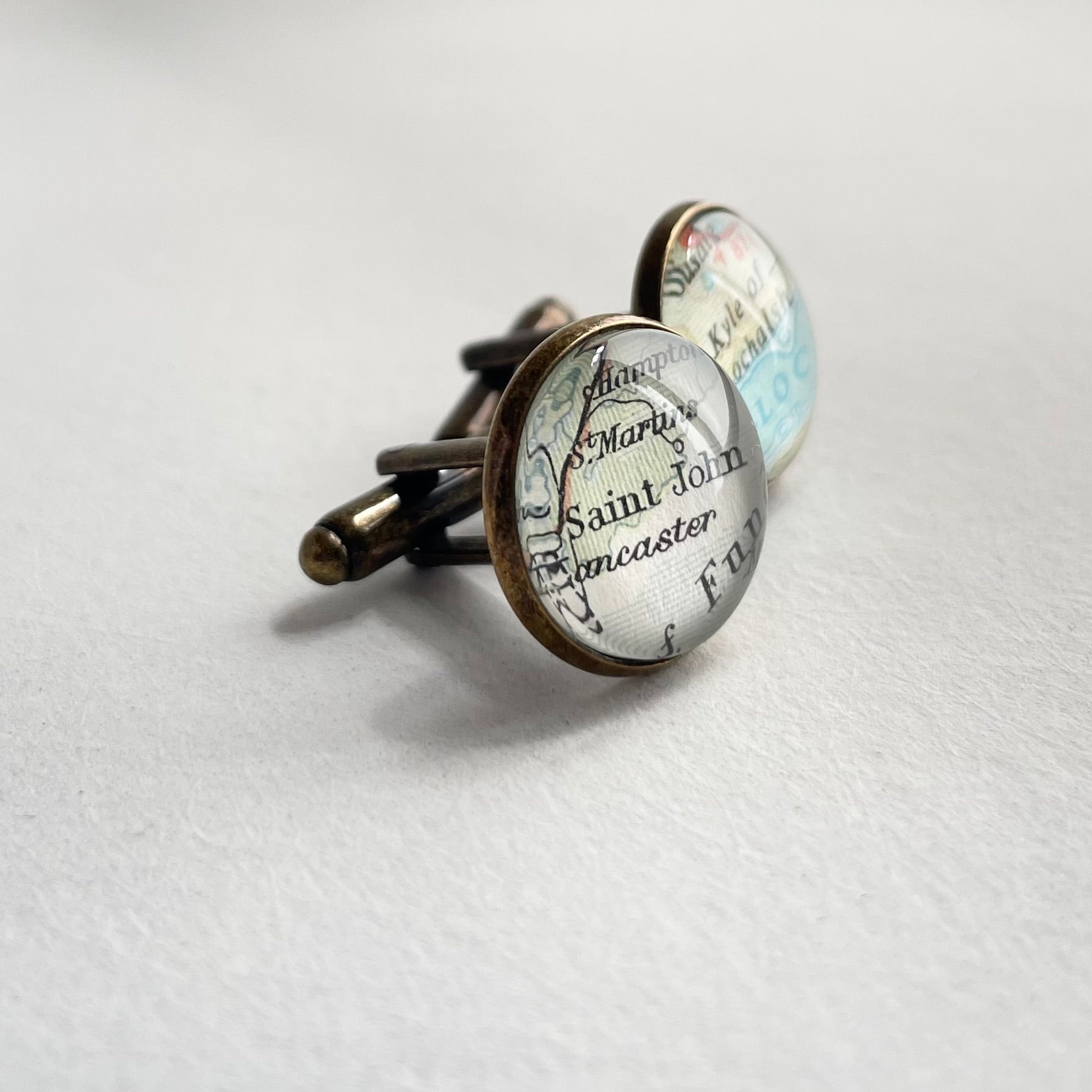 side view of bronze cufflinks